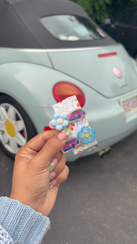 Pink and blue bug hair clips