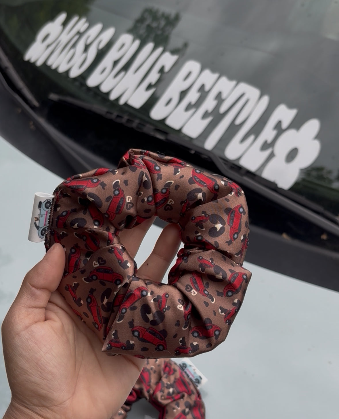 Red bug animal print scrunchie
