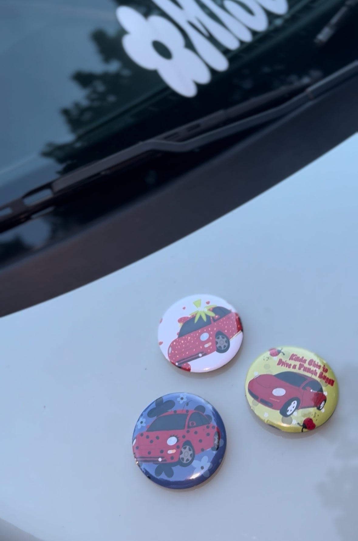 Red punch buggy buttons pins