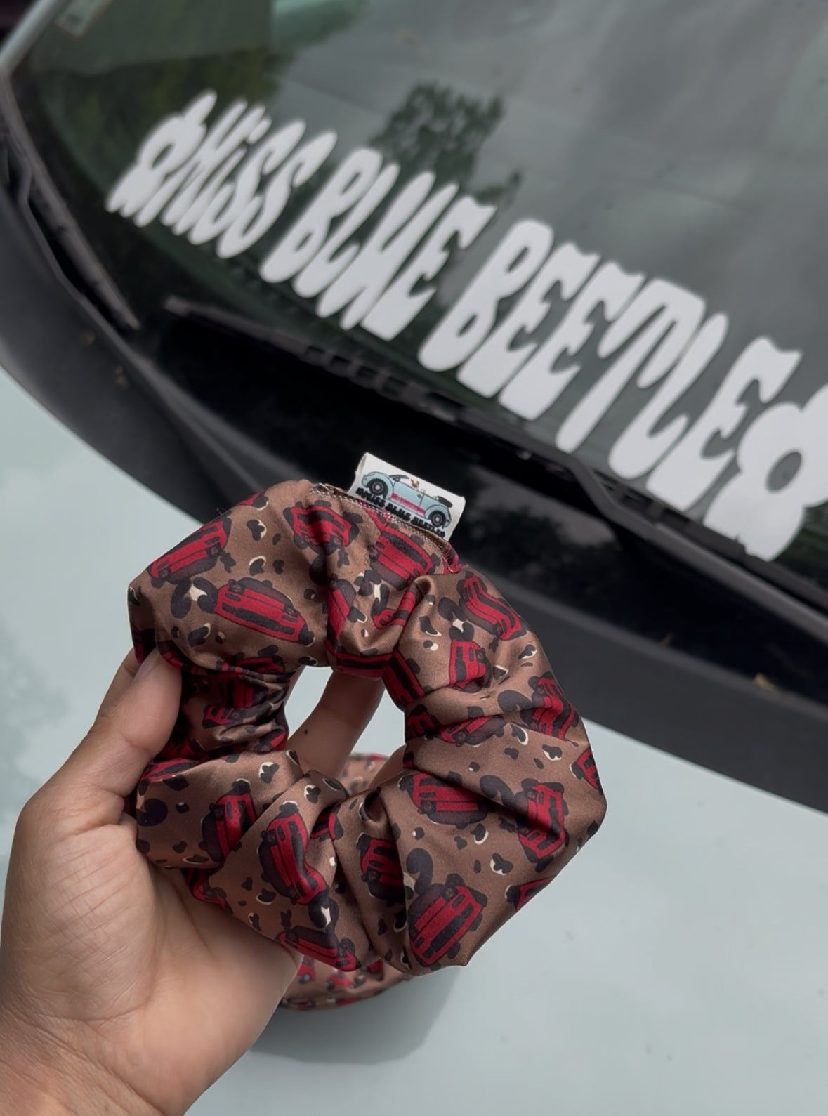 Red Miata animal print scrunchie